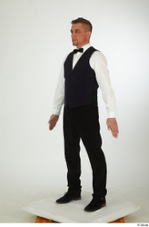 Steve Q black oxford shoes black trousers bow tie dressed purple vest smoking trousers standing white shirt whole body  jpg